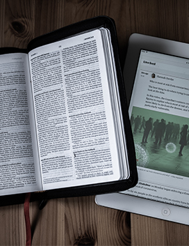 Open Bible and news site on tablet