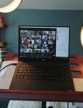 a laptop screen with lots of faces on it