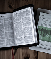 Open Bible and news site on tablet